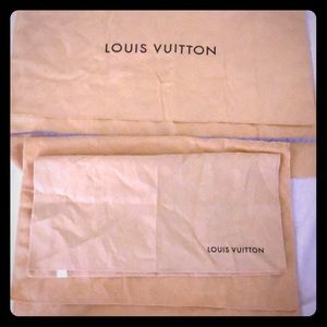 2 Louis Vuitton duster bags and cloth